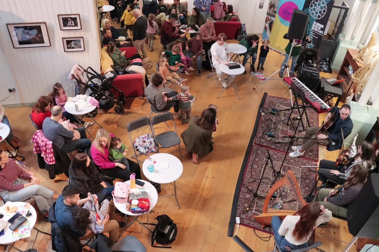 Families enjoy crafts, conversation and live music inside The Duncairn